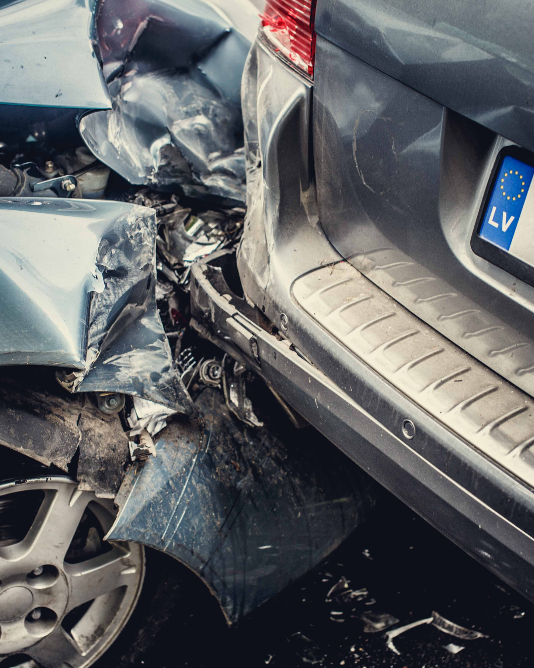 Rear-end car accident at a stoplight in CT involving injury claim.